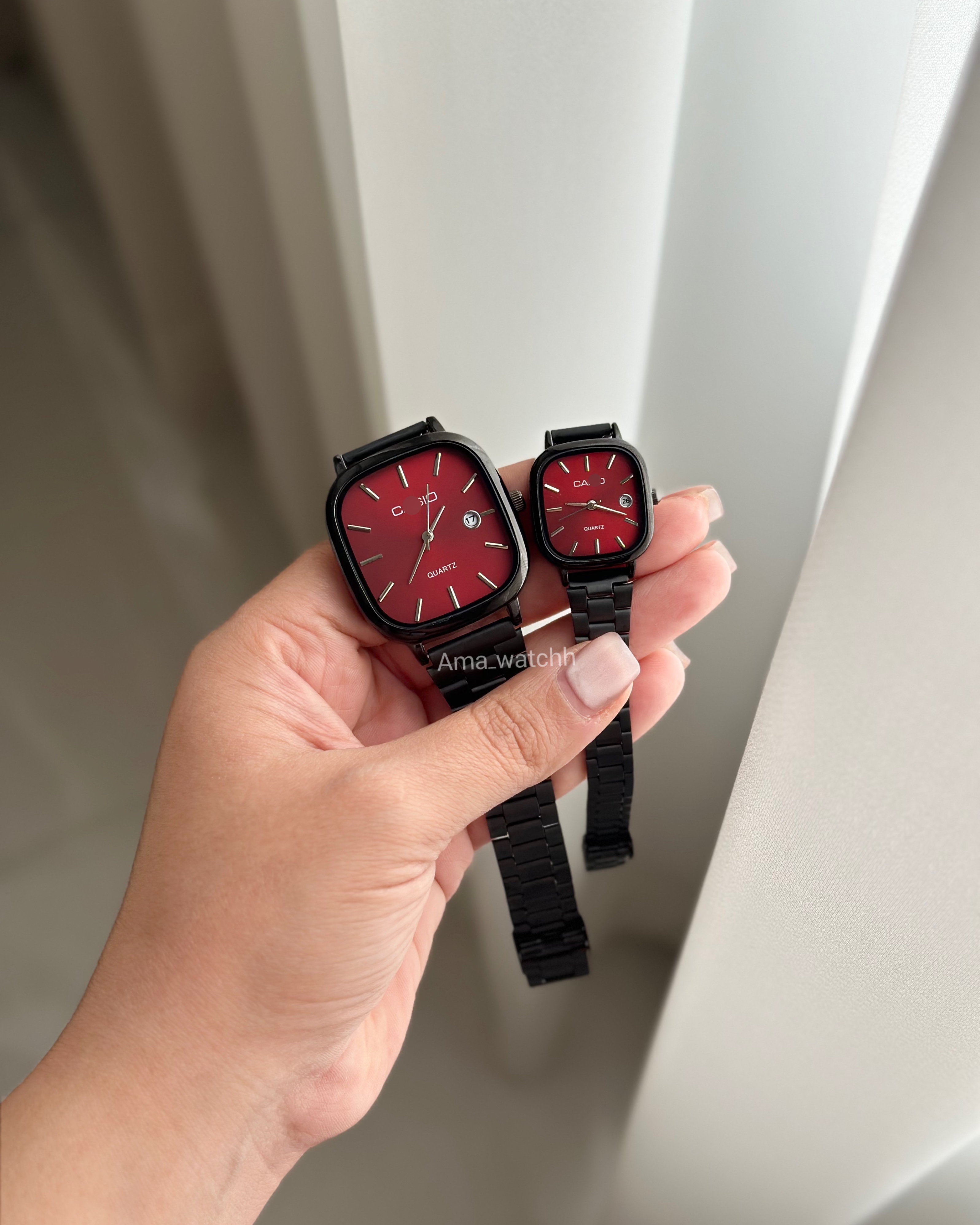 الدمانی بند مشکی صفحه قرمز